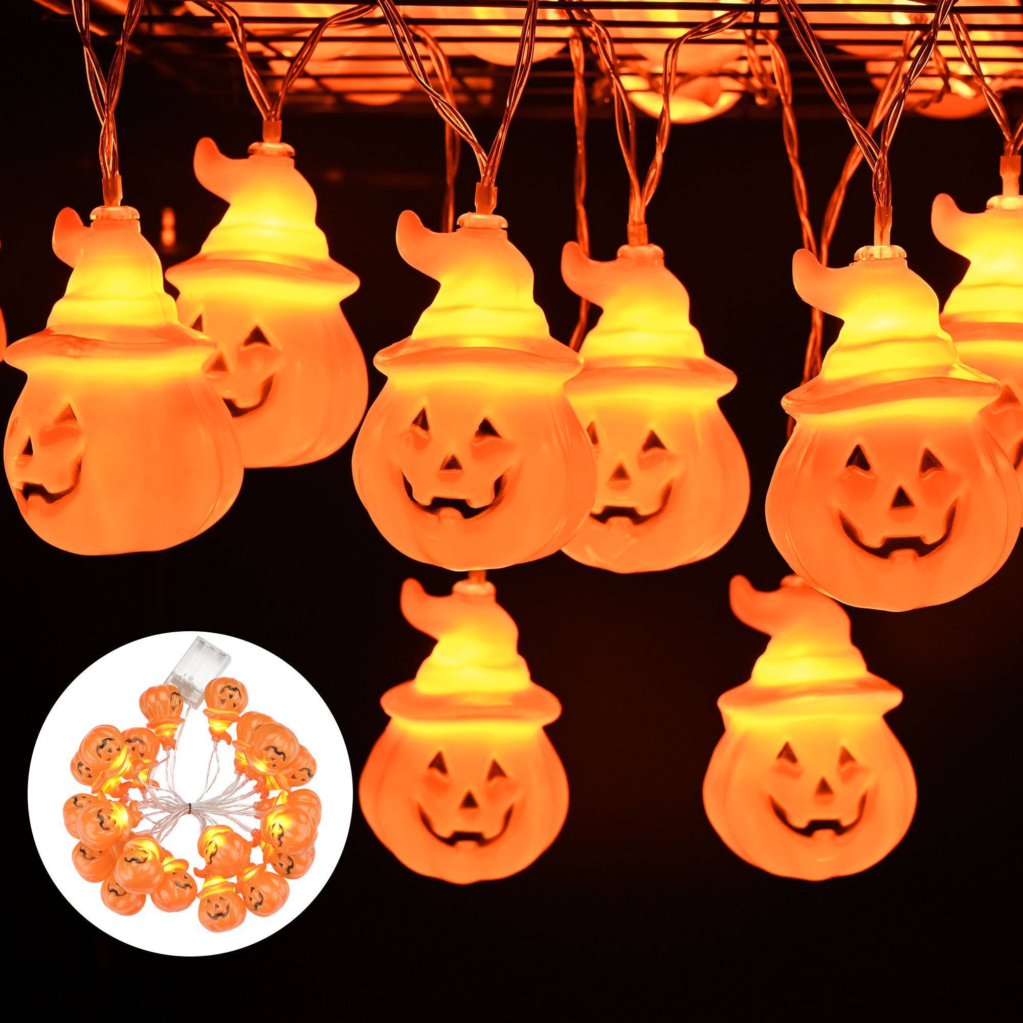 Close-up of battery-powered Halloween string lights with ghost and pumpkin shapes