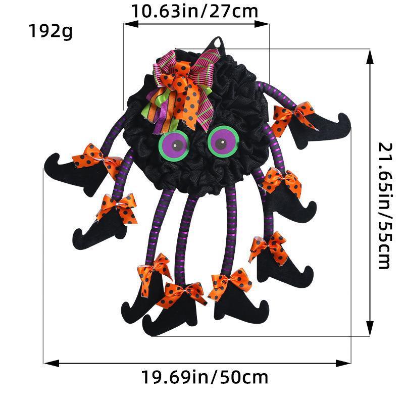 Multi-legged spider wreath hanging on a front door – Halloween spider web decoration